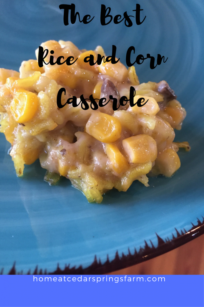 Yellow rice and corn casserole with text overlay.