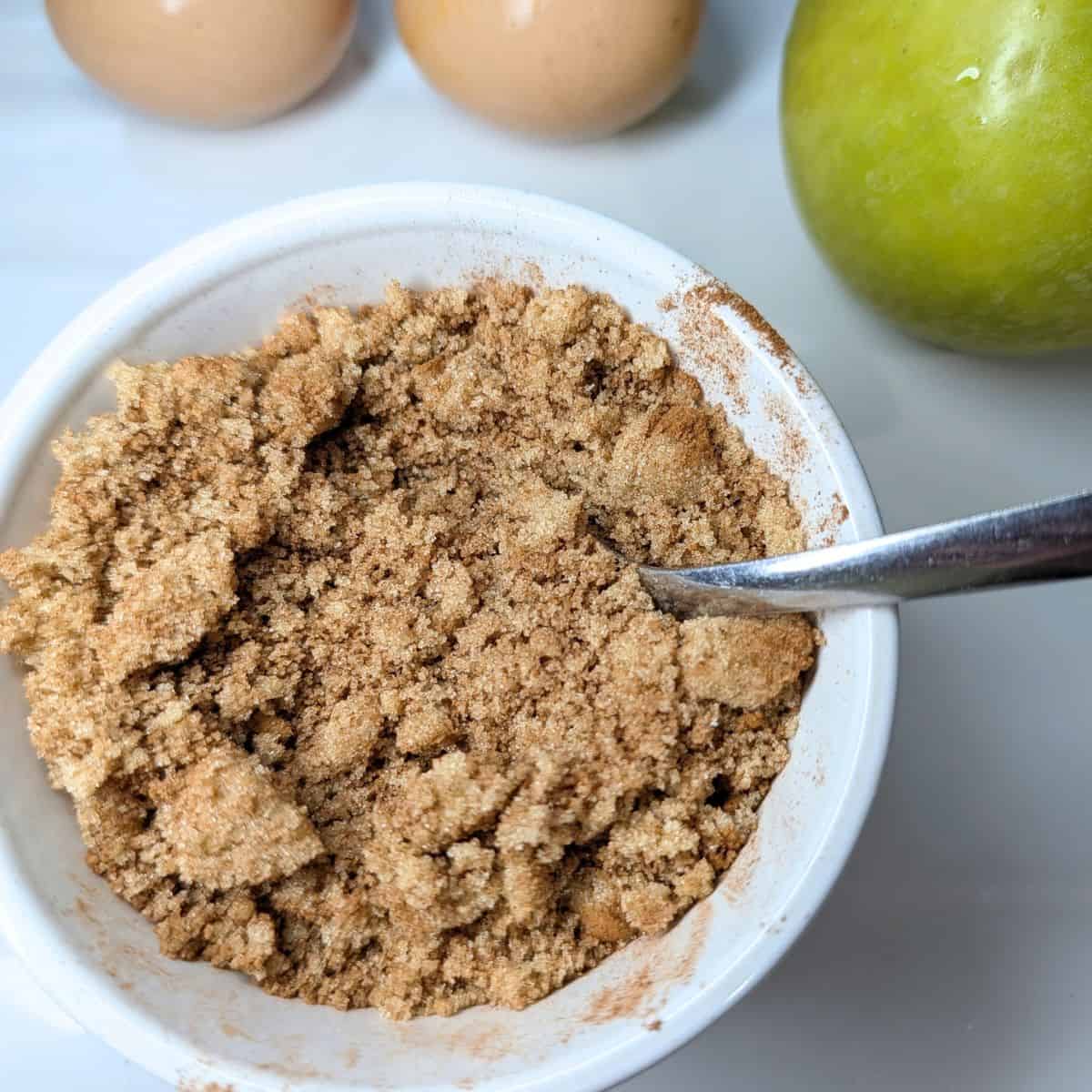 Cinnamon and sugar mixed in a bowl.
