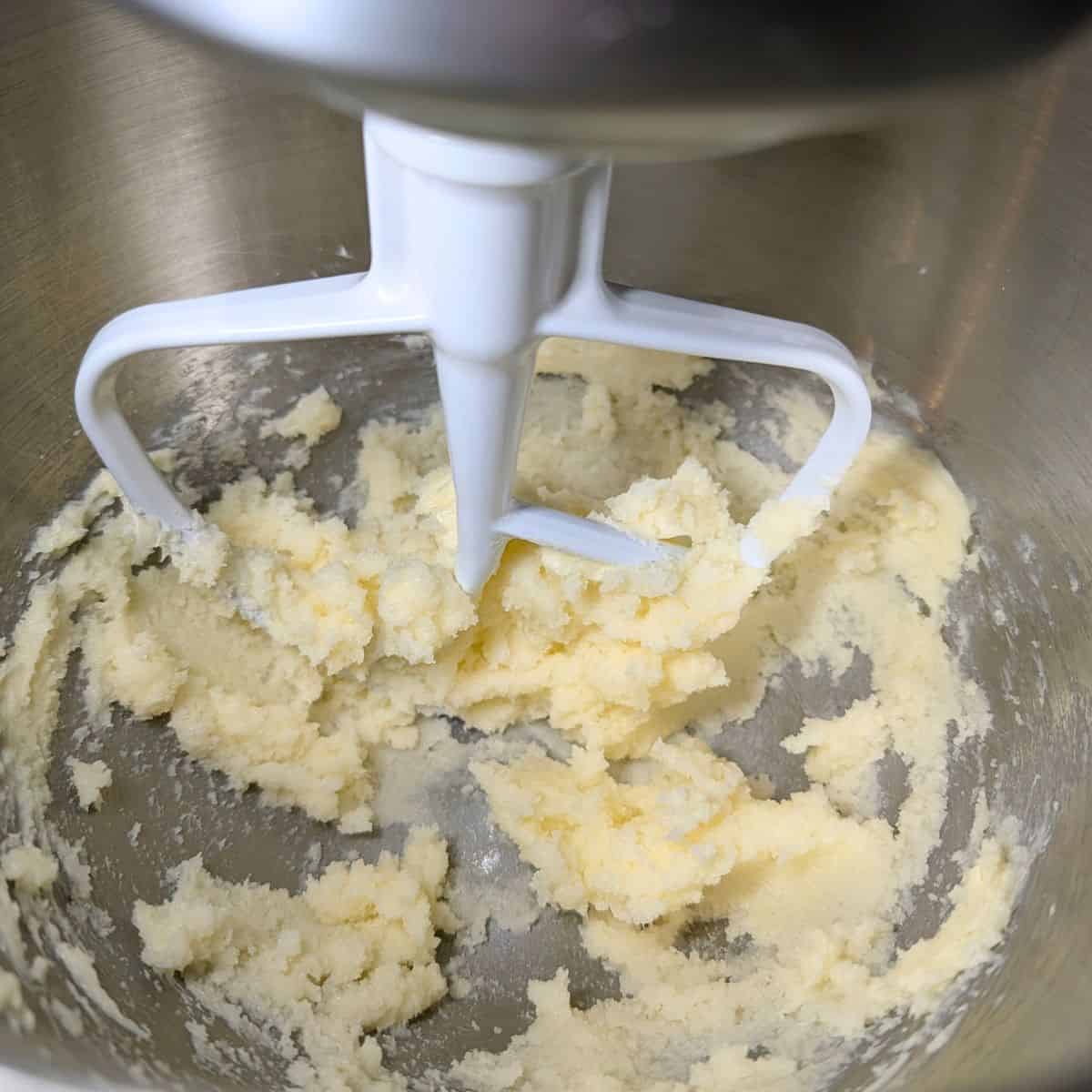 Creamed butter and sugar in a mixing bowl.
