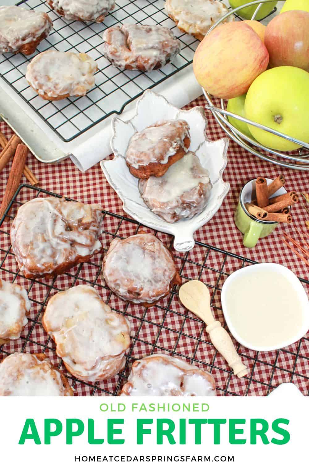 Old Fashioned Apple Fritters on a wire rack with whole apples and cinnamon sticks in the background, and text overlay.