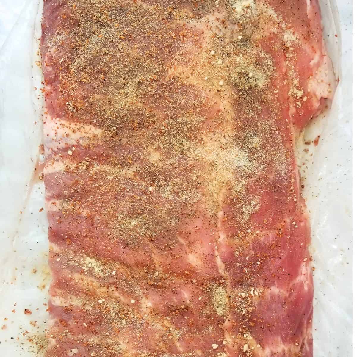 Pork spare ribs seasoned on both sides.