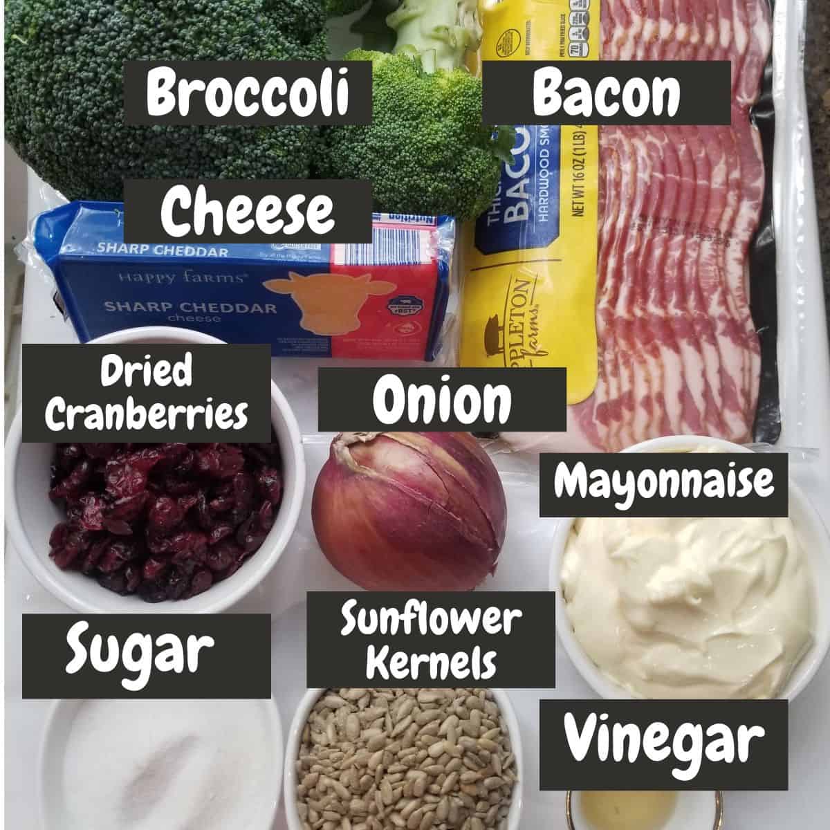 Ingredients needed for making bacon broccoli salad with text overlay.