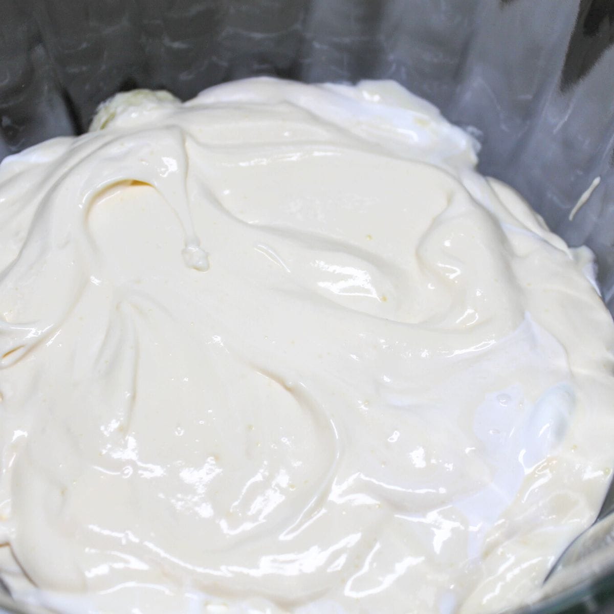 Folding in the Cool Whip for the pudding.