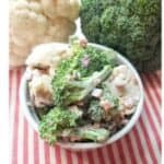 Broccoli Cauliflower Salad in a white bowl.