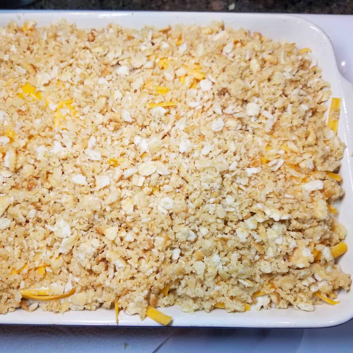 Crushed Ritz crackers mixed with melted butter for casserole topping.