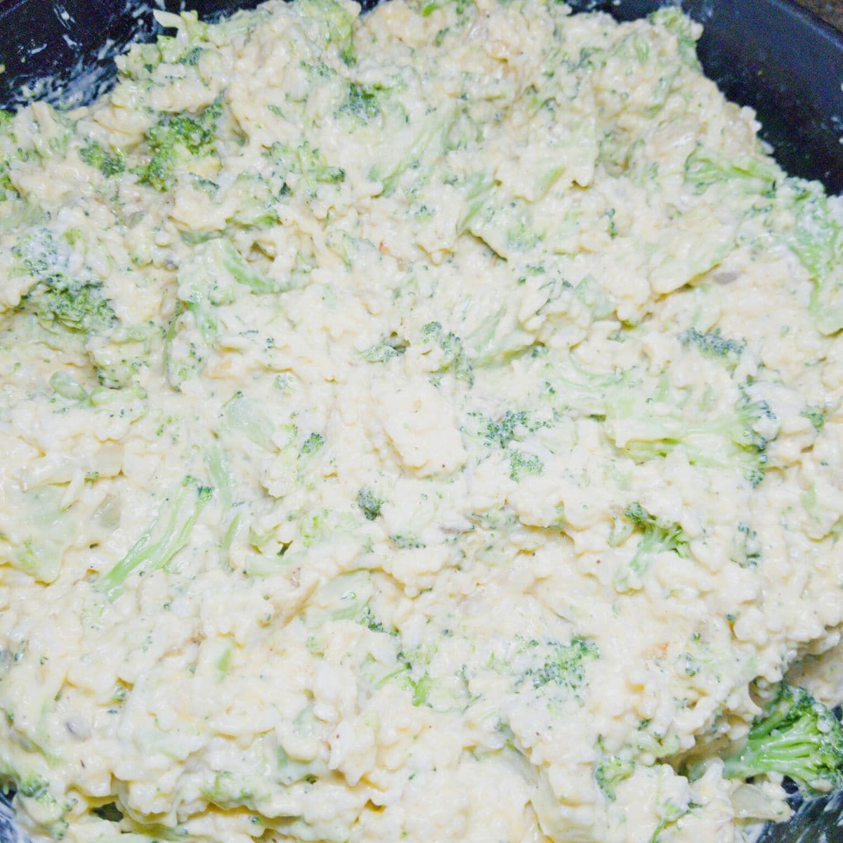 Rice and broccoli casserole mixed well with ingredients.