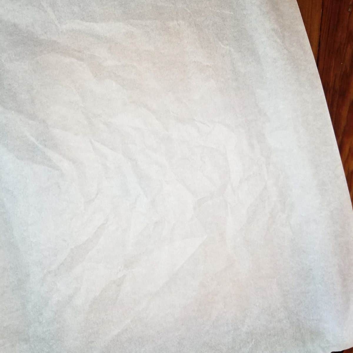 Parchment paper on a baking sheet.