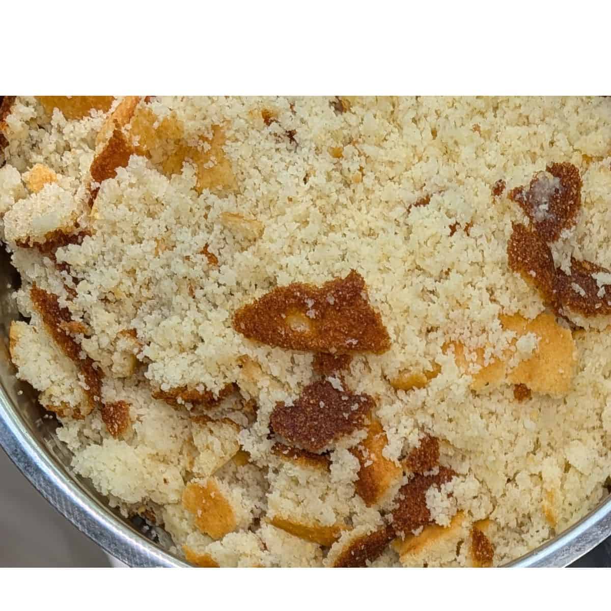 Crumbled cornbread in a bowl.