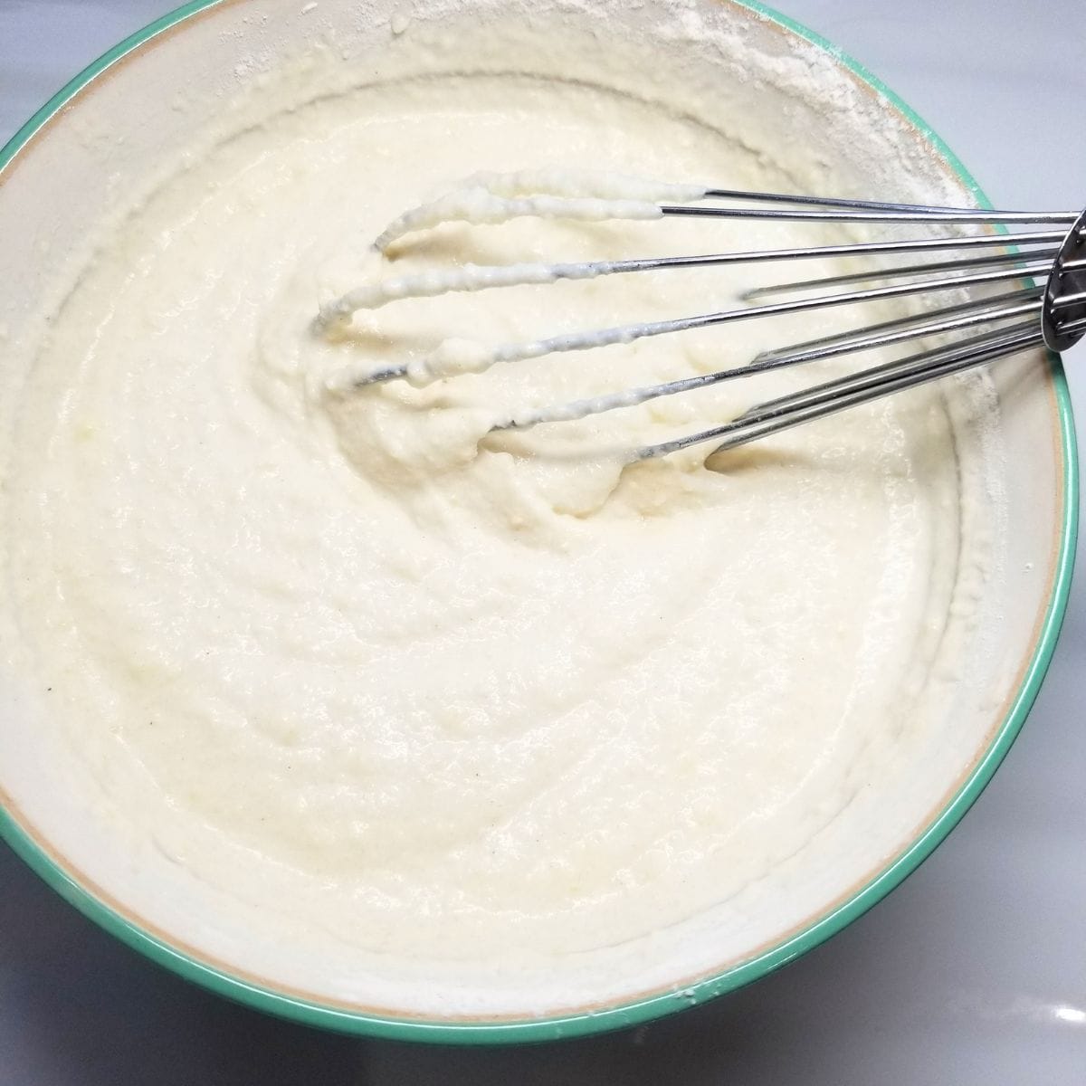 Mixing the flour topping to form the crust.