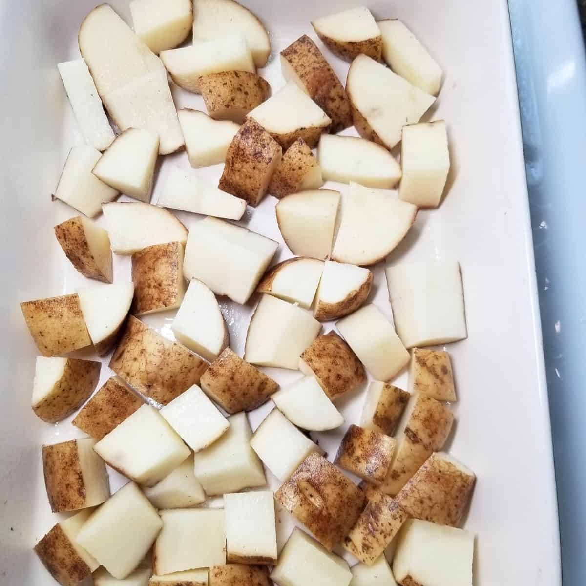 Diced potatoes in a baking dish.