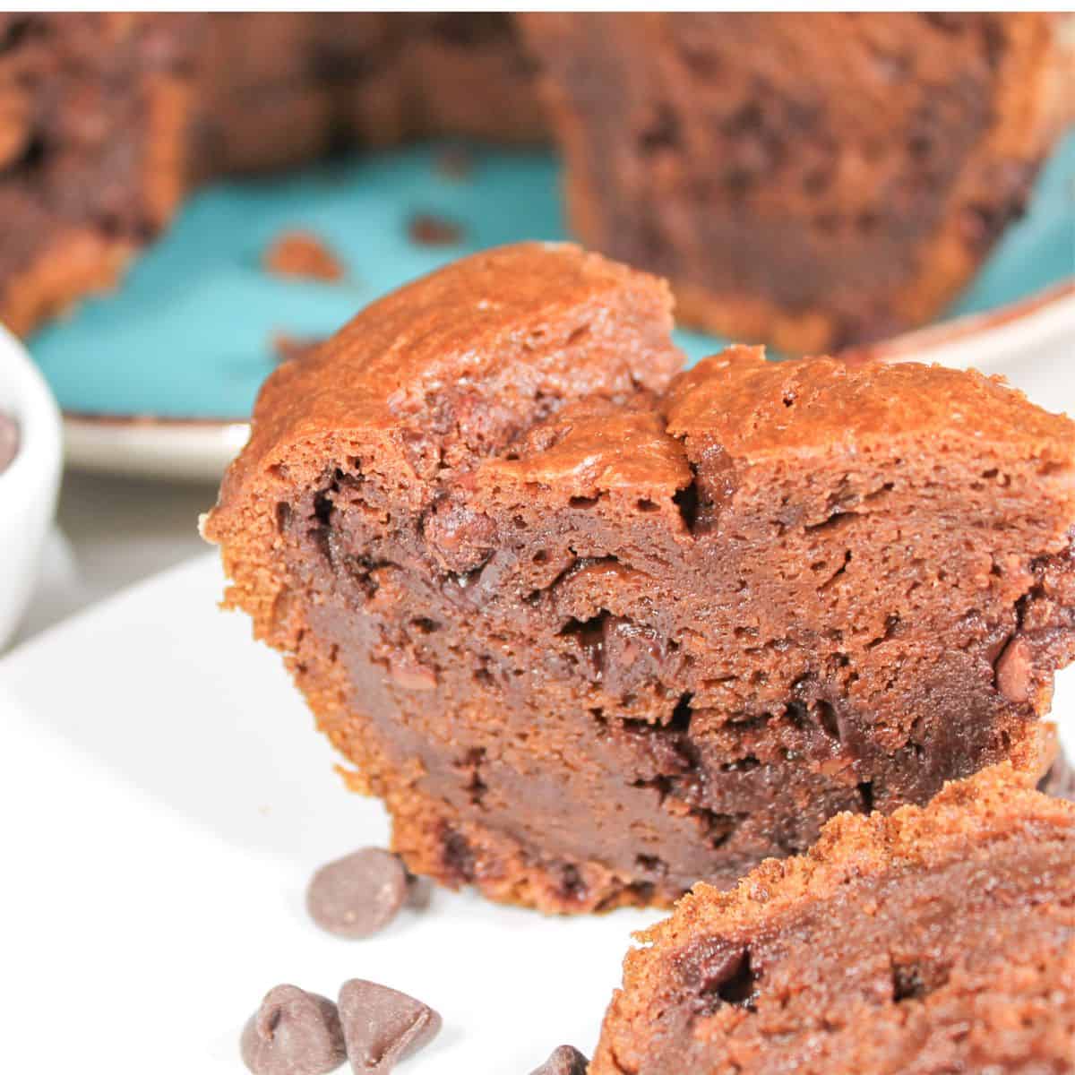 Chocolate Bundt cake sliced on a plate.