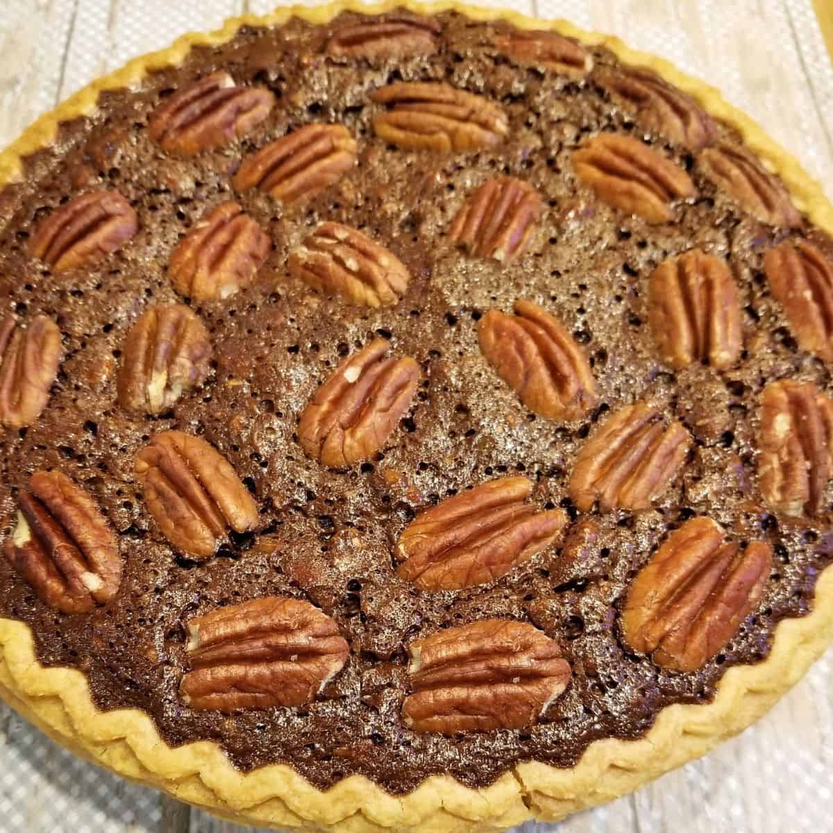 A baked chocolate pecan pie.