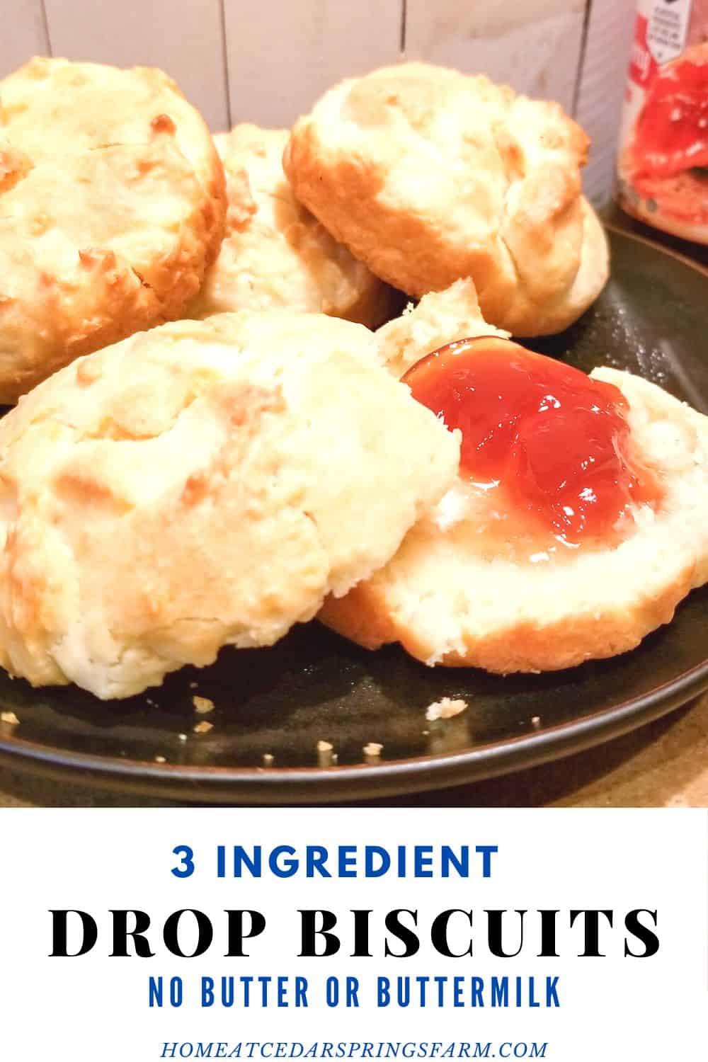 3 Ingredient Drop Biscuits on a black plate with strawberry jam and text overlay.