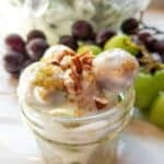Grape salad with cream cheese in a serving dish.