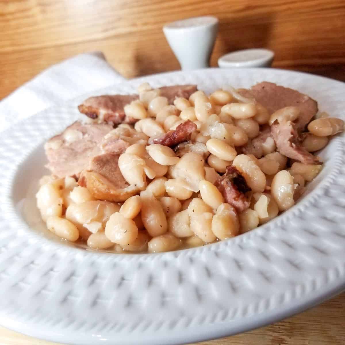Close-up of tender Great Northern beans showing creamy texture after cooking.