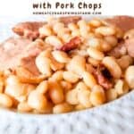 Great Northern Beans in a white bowl with pork chops.