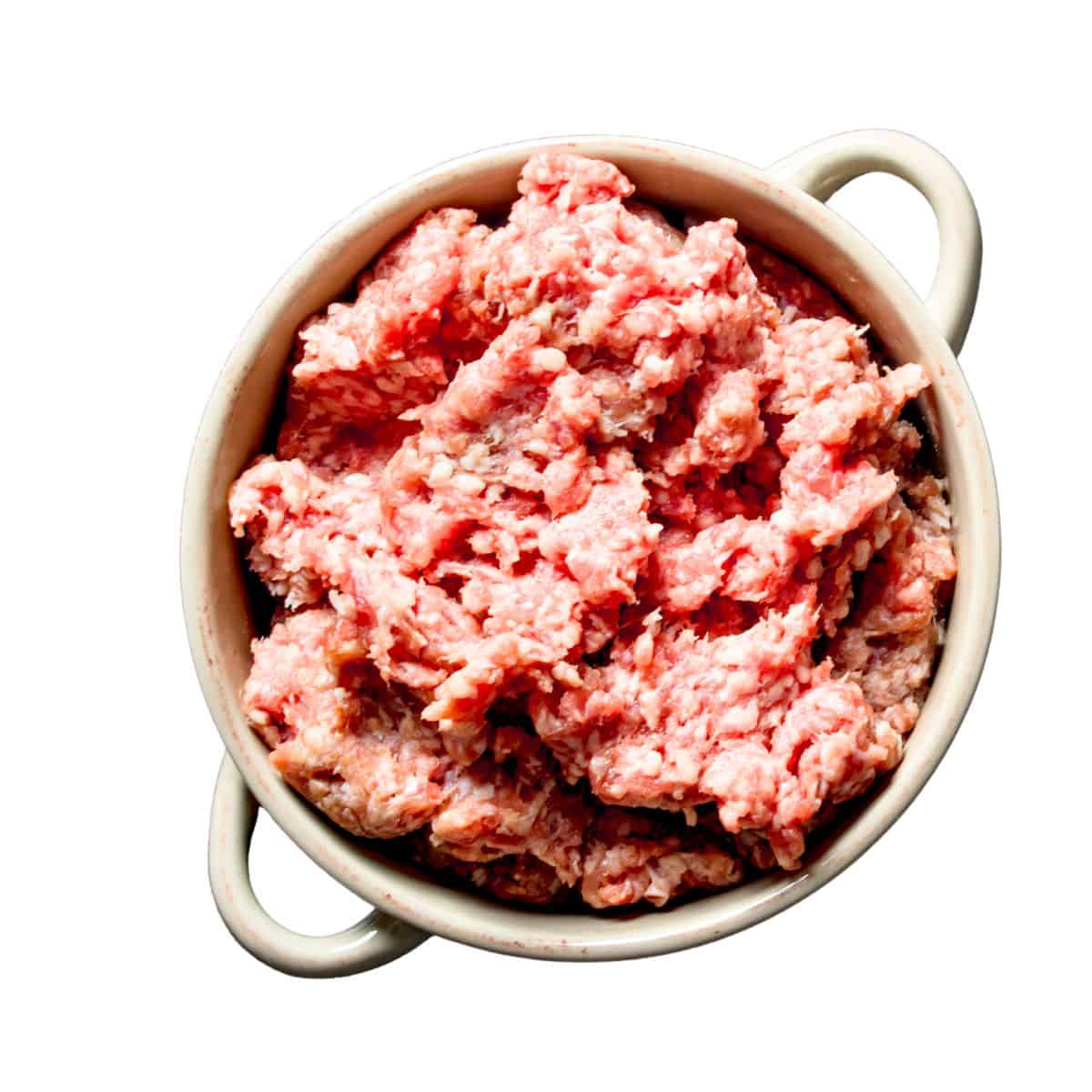 Mixing ground beef and ingredients.