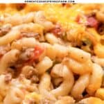 Ground beef casserole with noodles on a plate with text overlay.