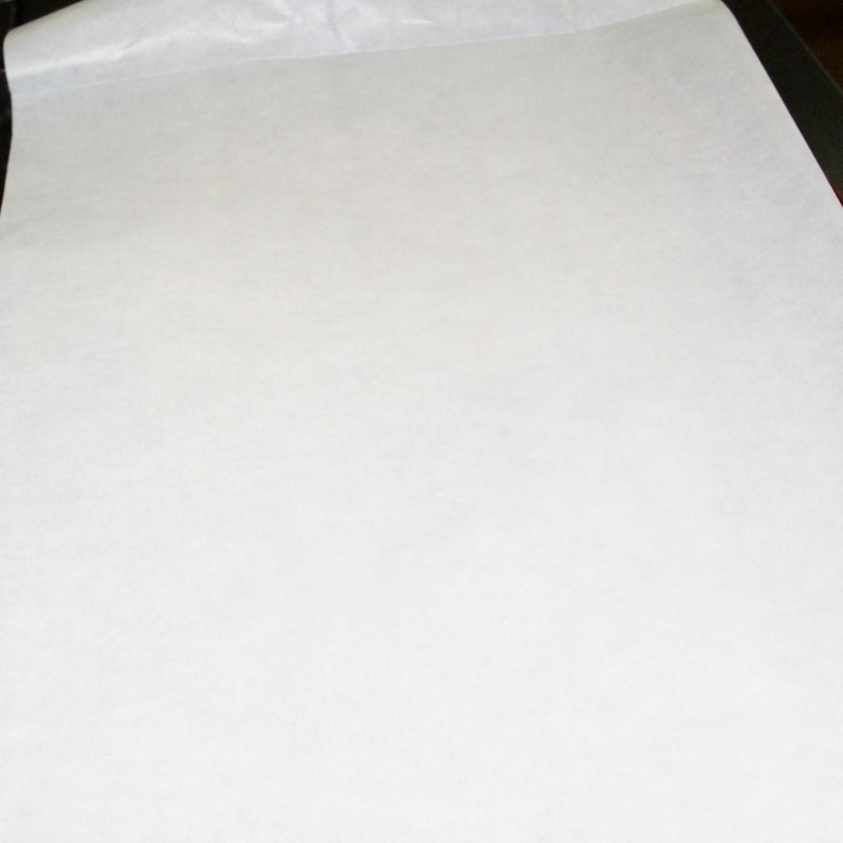 A baking sheet lined with parchment paper.
