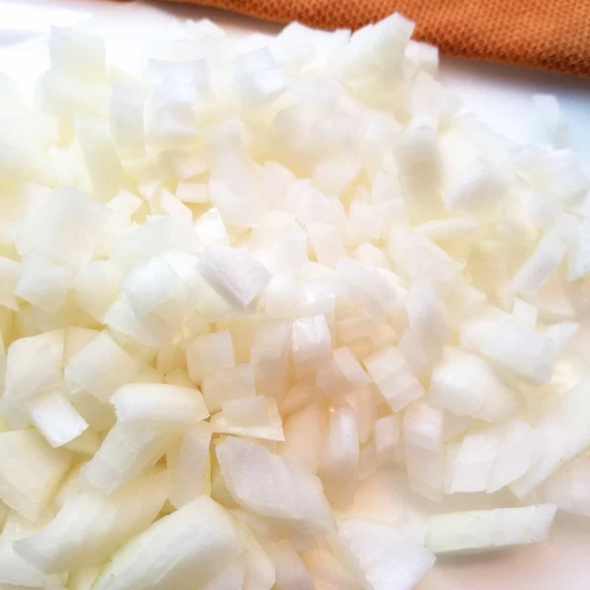 Chopped onions on a pan.