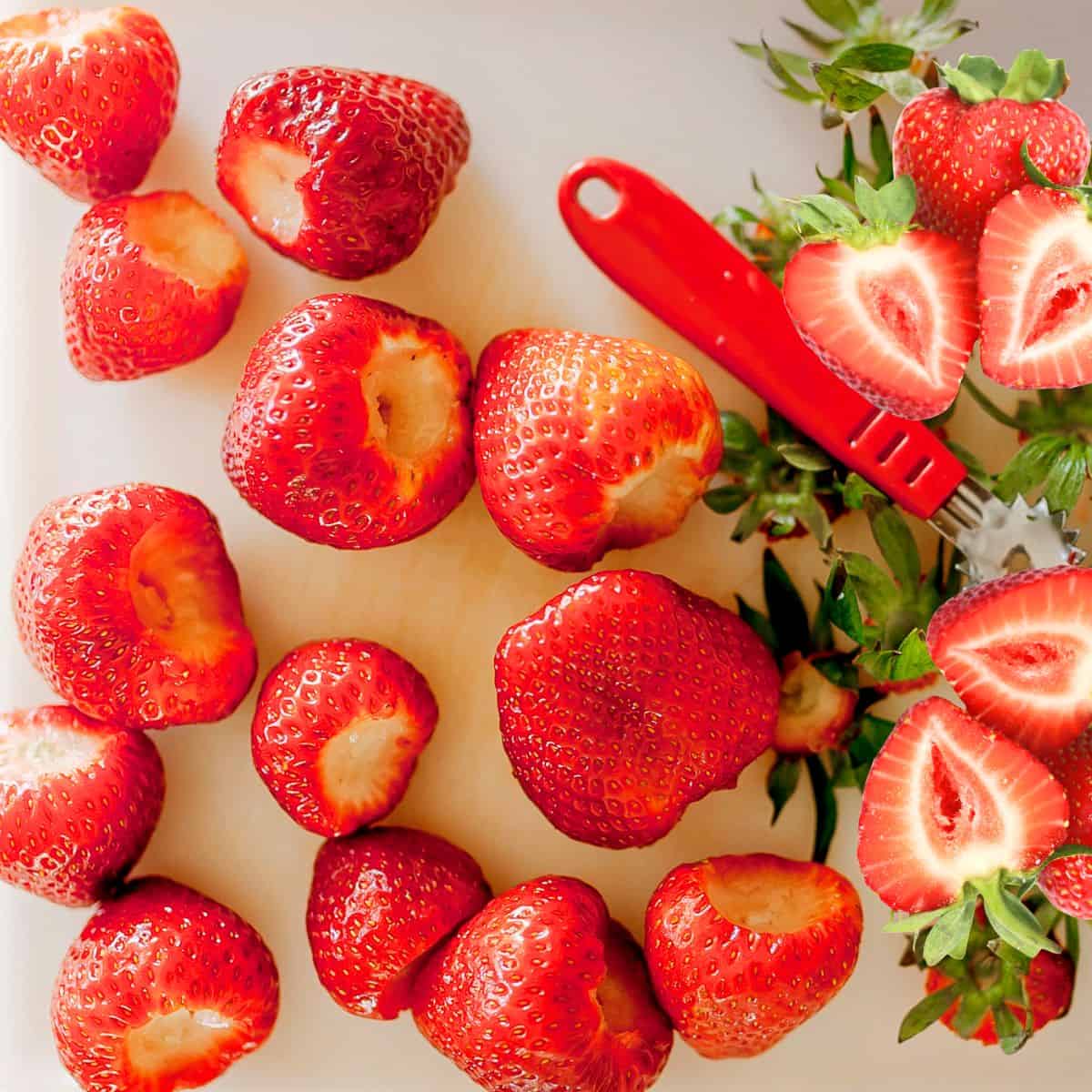 Whole strawberries hulled with the stem and core removed.