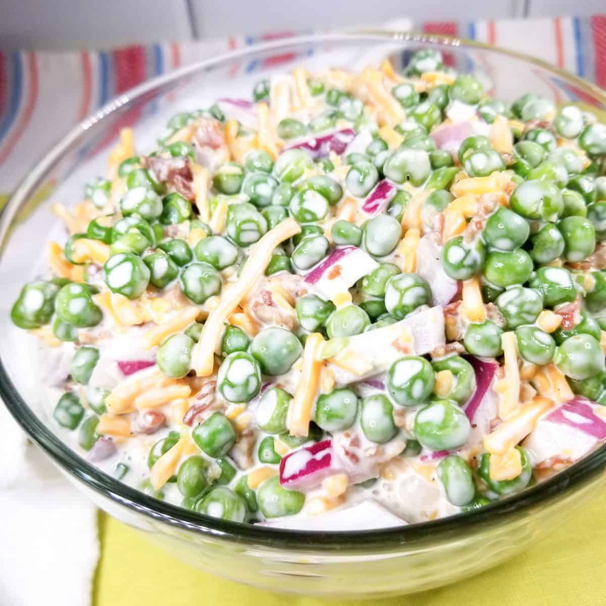 English pea salad in a serving bowl.