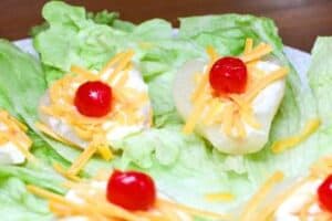 Pear salad on a bed of lettuce leaves.
