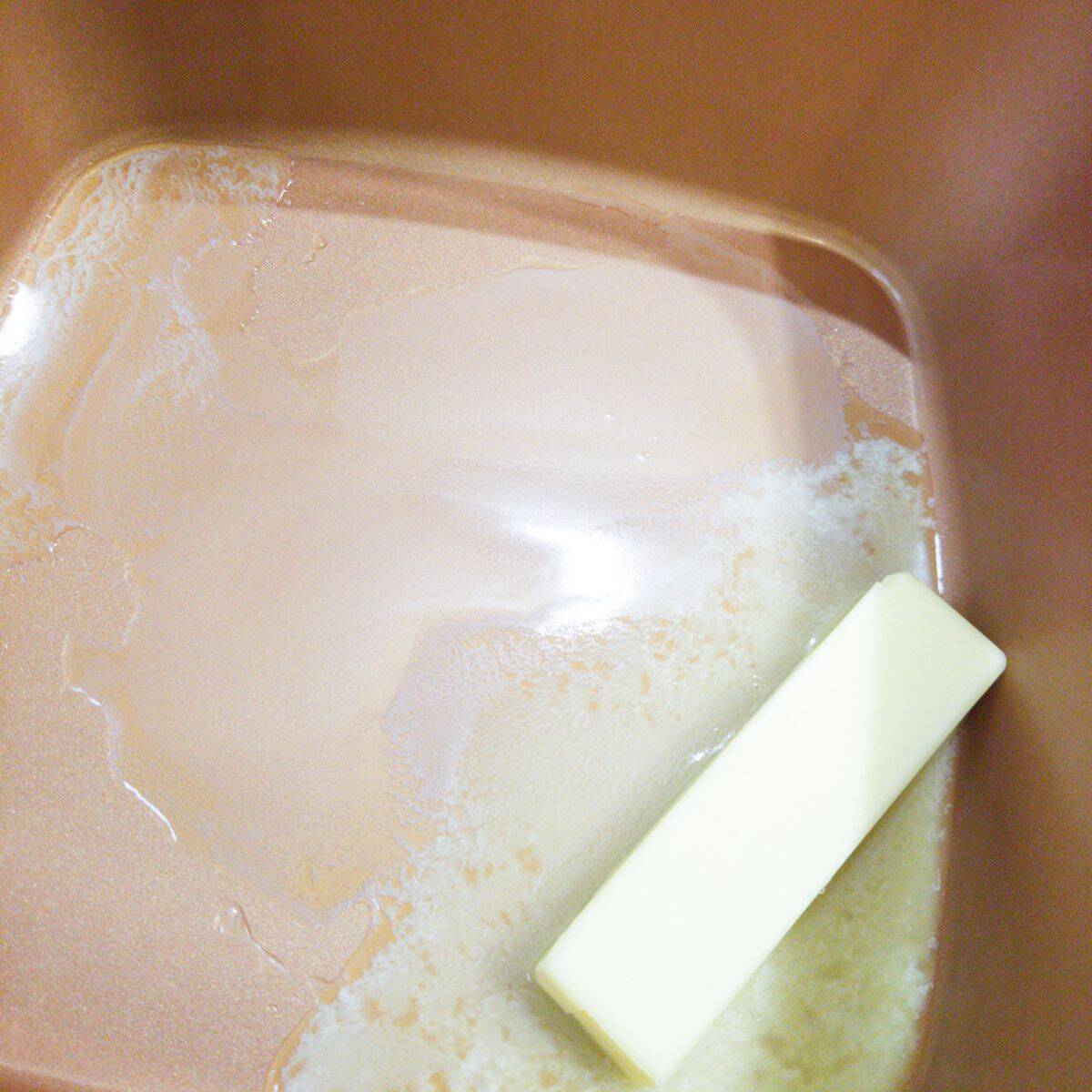 Melting butter in a pot.