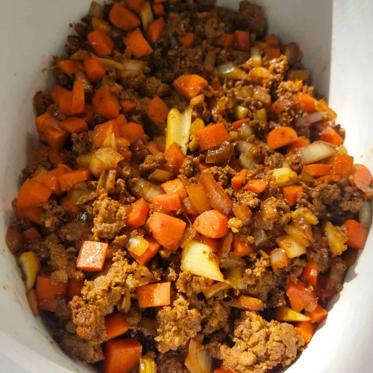 Cooked sausage and vegetables.