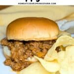 Sloppy Joe on a bun with chips on the side. Text overlay.