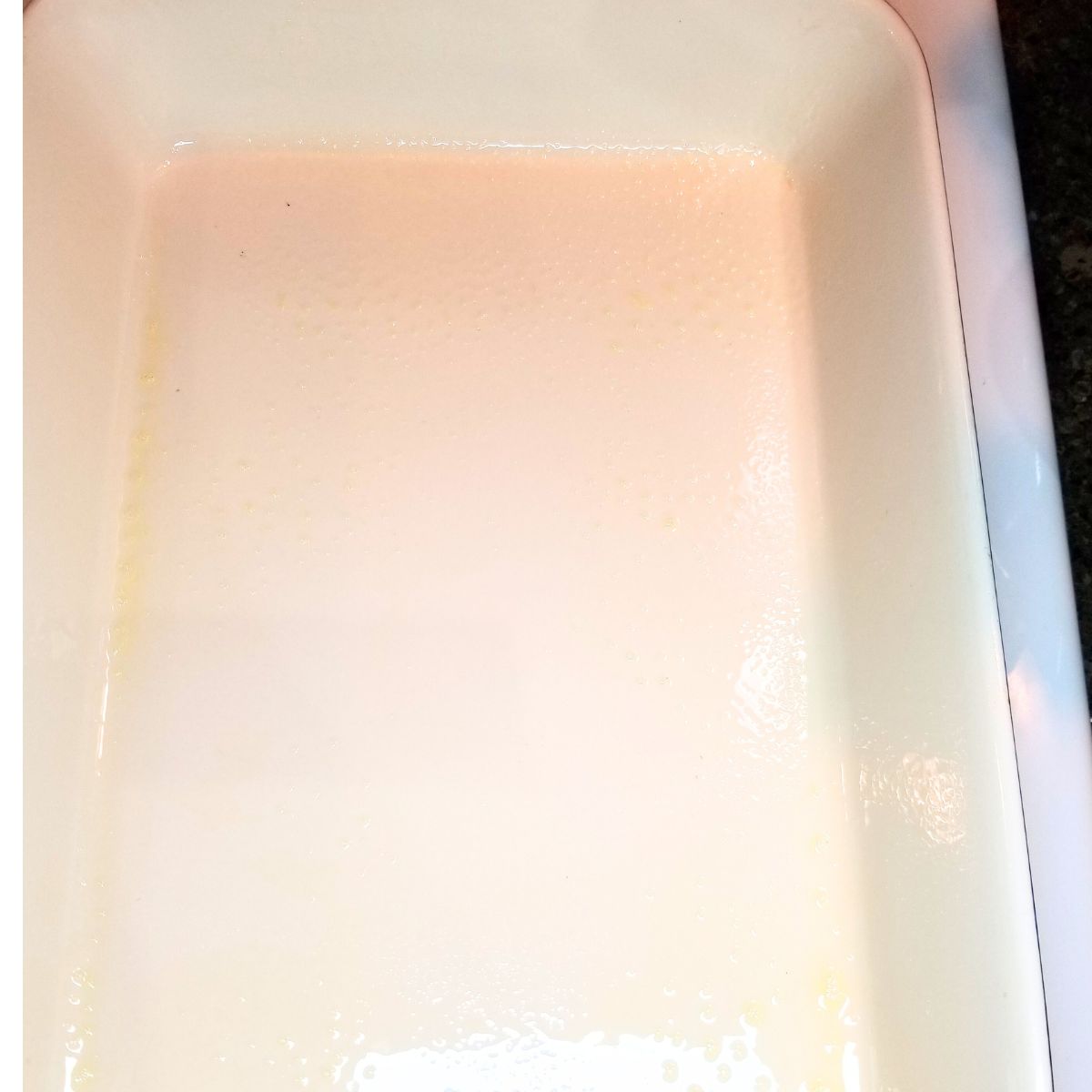 A greased baking dish.