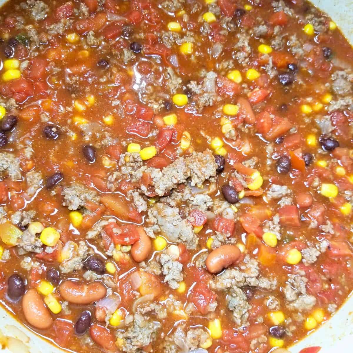 Easy Taco soup simmering in a pot.