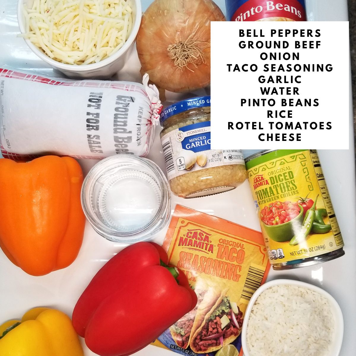 Ingredients needed for making cheesy stuffed peppers with text overlay.