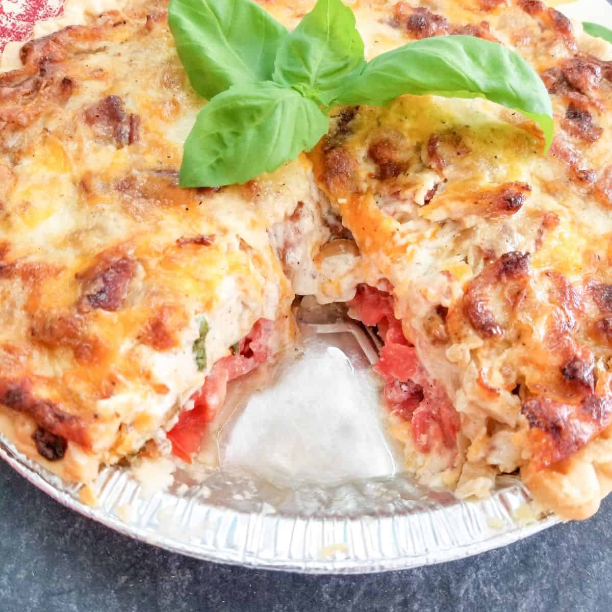 Southern Tomato Pie with basil on top.
