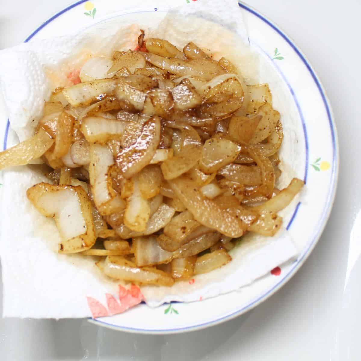 Cooked onions in a bowl.
