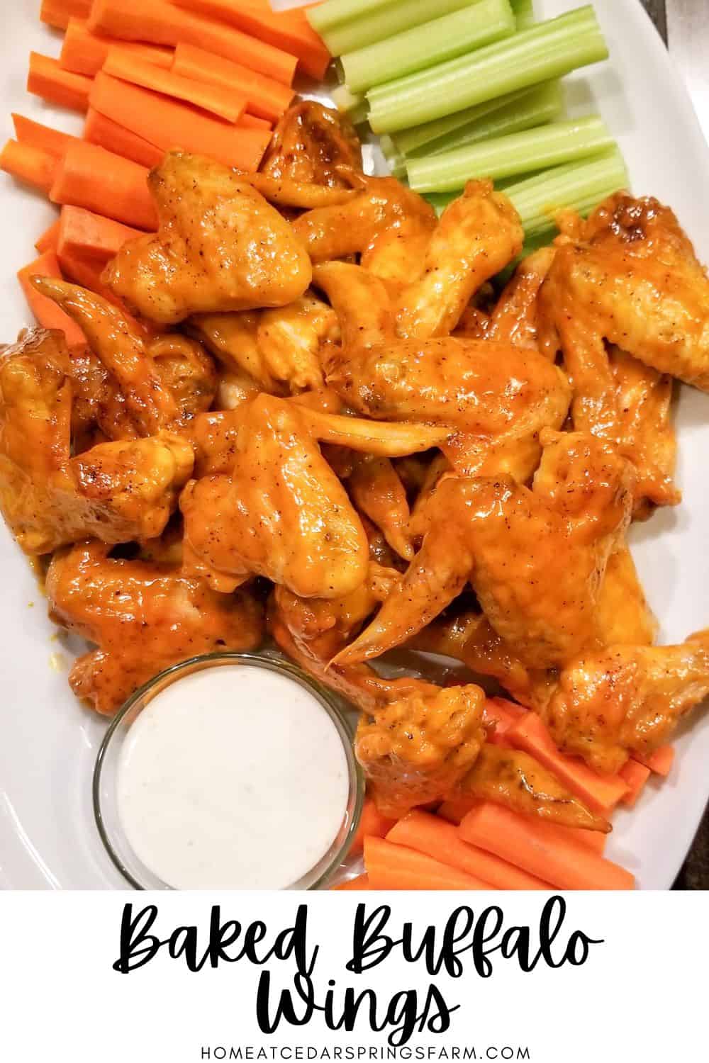 Buffalo Chicken Wings on a white platter with carrots, celery and text overlay.