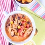 Chicken chili in a white bowl.