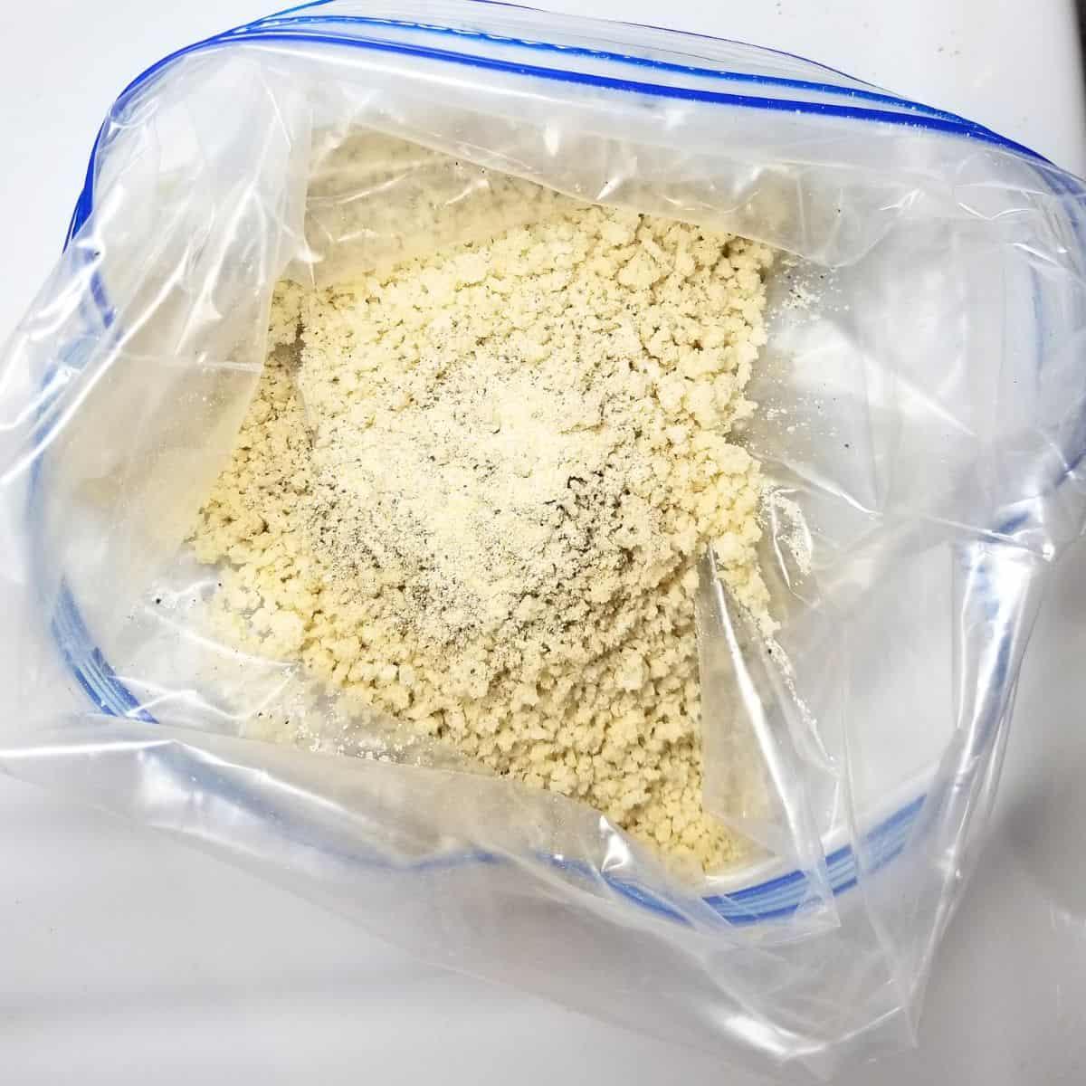 A zip top bag with breading ingredients.