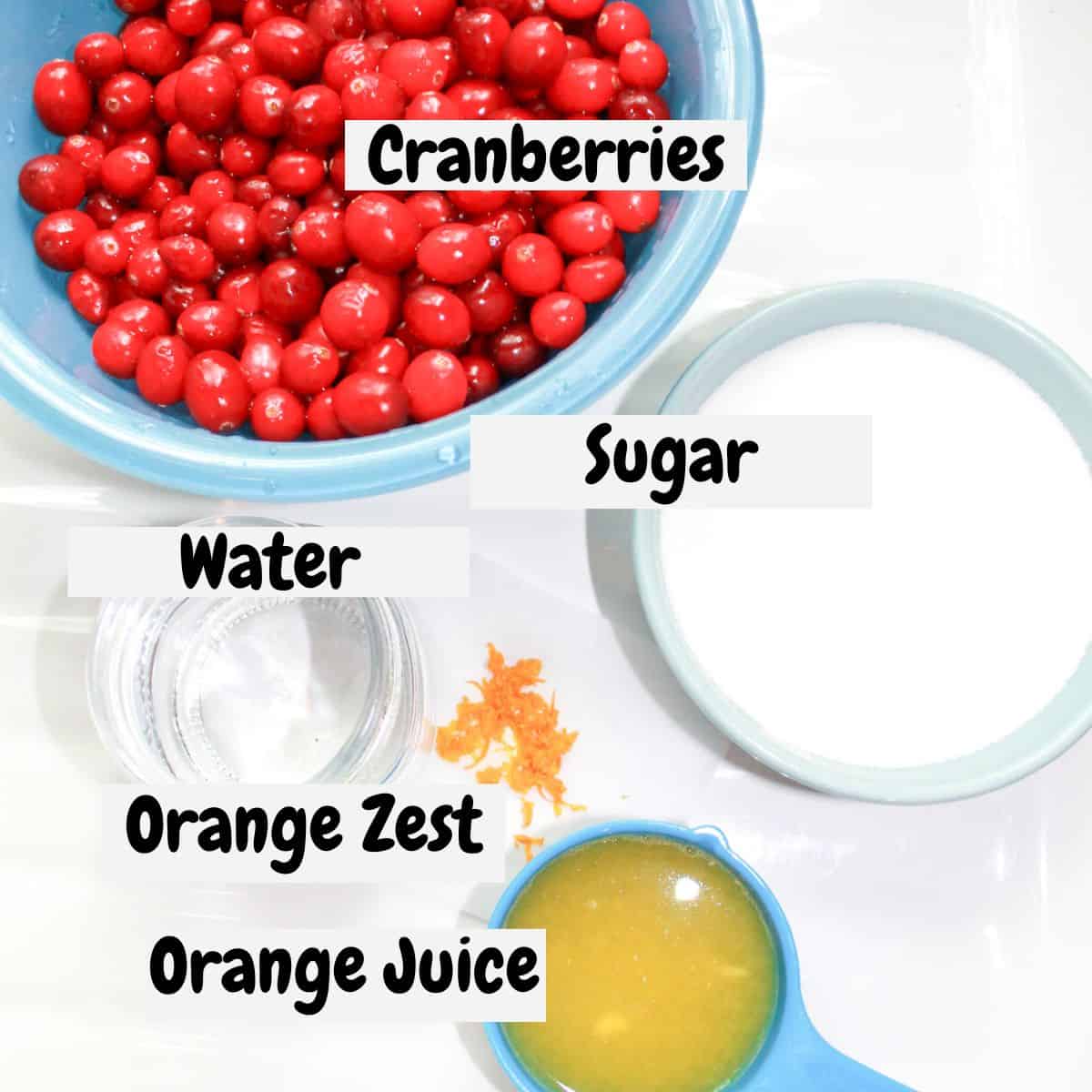 Ingredients needed for making cranberry sauce with orange.