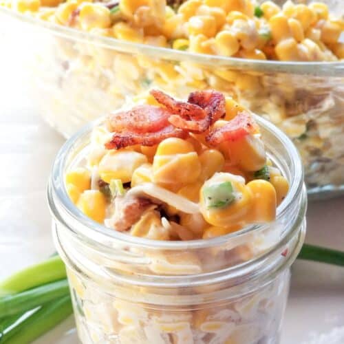 Corn salad with jalapenos in a dish.