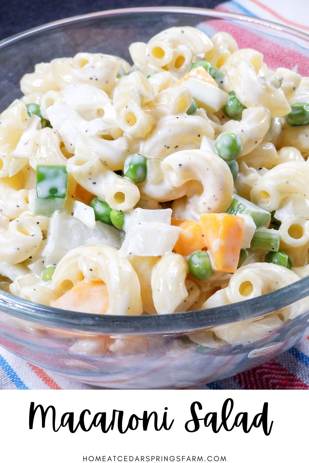 picture of macaroni salad in a bowl with text overlay