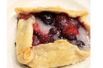 Mixed Berry Galette on a white plate.