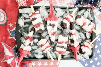 red white and blue popsicles over ice