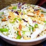 Coleslaw in a white bowl.