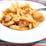 chicken bacon ranch pasta casserole in a white bowl