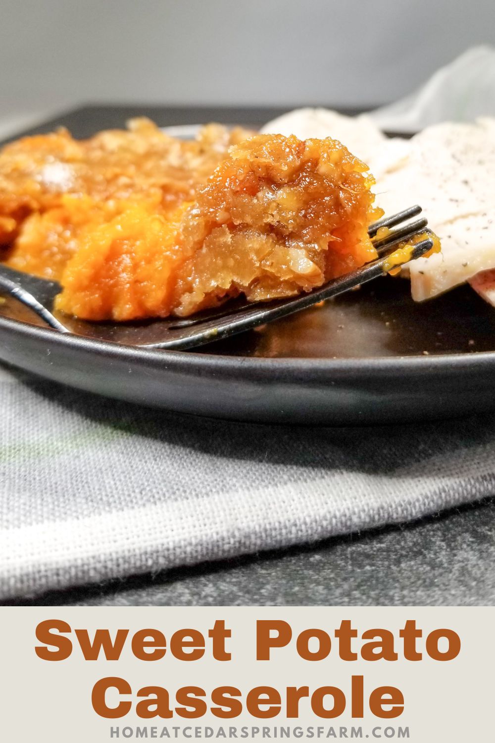 sweet potato casserole on a fork and plate with text overlay.